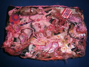 La pochette rose côté art textile